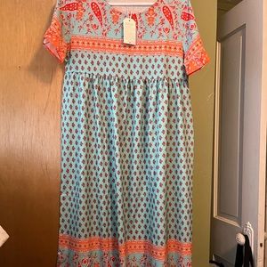 Vintage looking prairie style dress. Empire waist. Size Medium. Never worn.